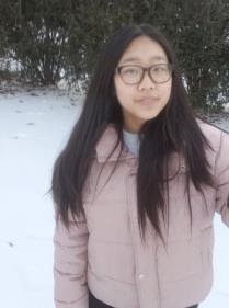 Liana Zhou is an eighth grader who likes reading and hanging out with her friends. 