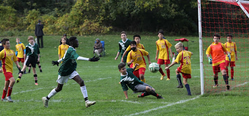 The Clague Cougars playing their final match of the season against the Slauson Golden Bears. 