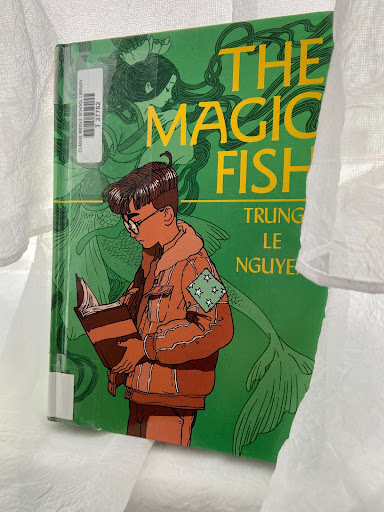 Set in the 1990s, The Magic Fish tells the story of 13-year old Tiến, an American-Vietnamese boy, struggling to come out to his parents as gay. Copy of book from Clague Middle School Library