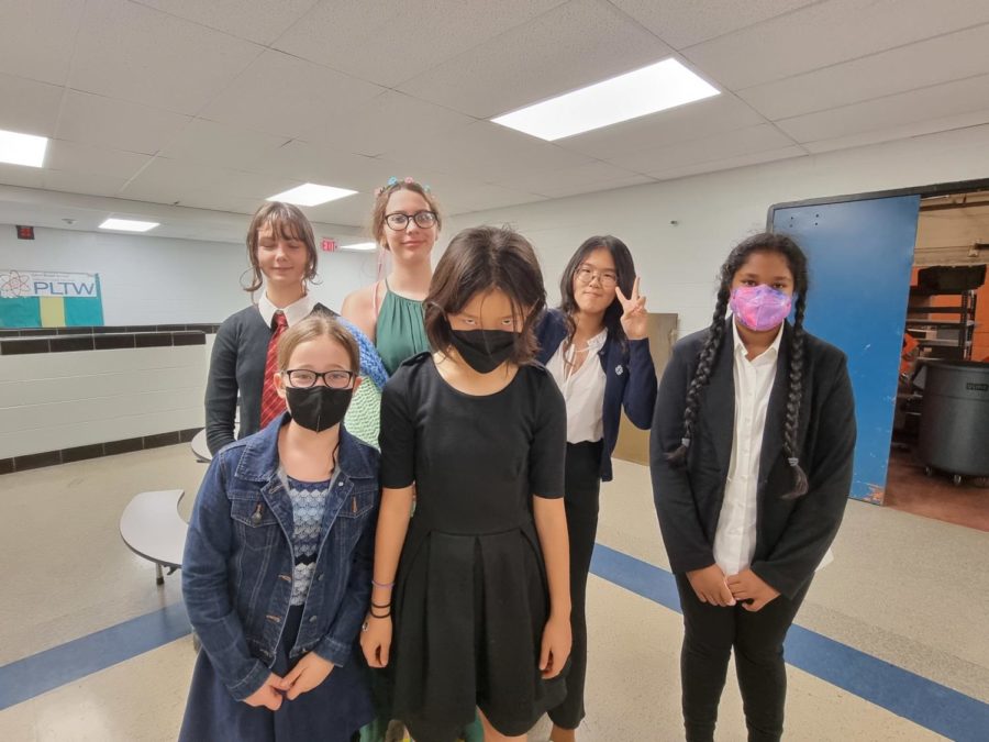 7th graders Ruth Bush, Gabriella Foster, Erin Yim, Ruhani Nagrath, Claire Fort, Deborah Song during Spirit Week on Formal Day, 10/26/22 at Clague Middle School. 