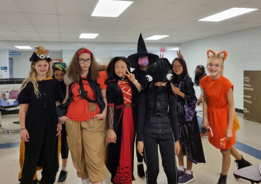 7th graders Kelsey Daniels, Maria Cassone, Gabriella Foster, Halynn Kim, Ruhani Nagrath, Deborah Song, Zoe Bossmann  during Spirit Week on Costume Day, 10/28/22 at Clague Middle School. 