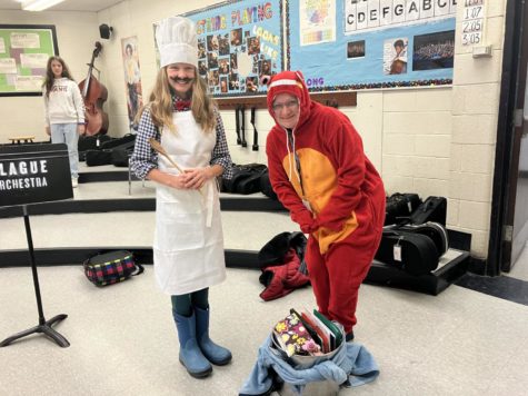 6th grader Margaux Stout and Clague Orchestra teacher Ms. Paddock during Spirit Week on Costume Day, 10/28/22 at Clague Middle School. 