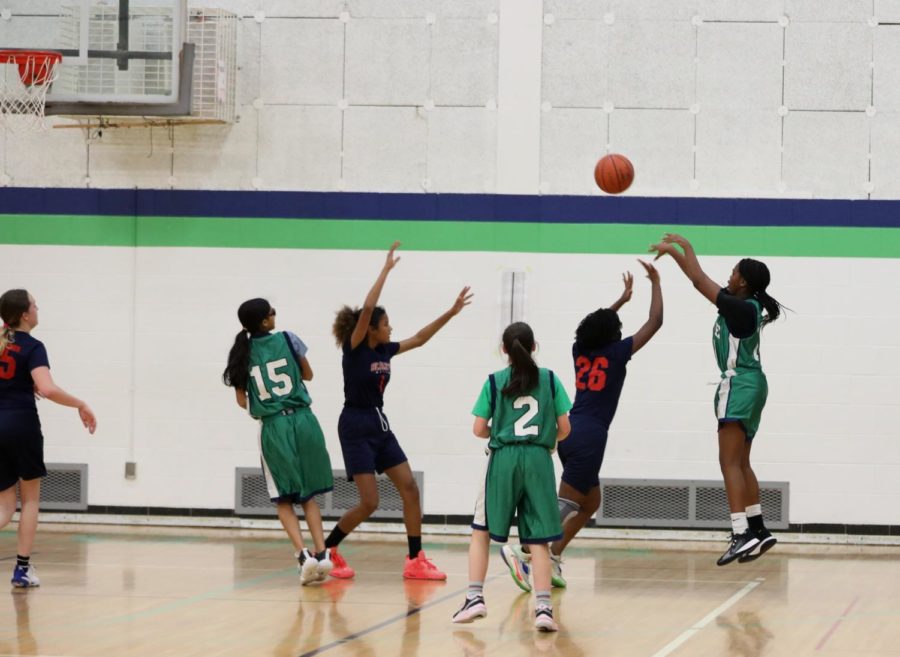 7th grade girls basketball team during a match against Scarlett on December 15, 2022 at Clague Middle School. 