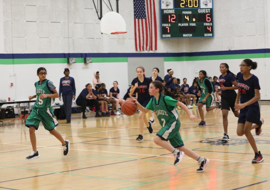7th grade girls basketball team during a match against Scarlett on December 15, 2022 at Clague Middle School. 