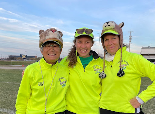 Coach Karen Yamada, Laurel Boelens, and Michelle Machiele taking a group photo after the Oct. 27 cross country meet at Pioneer High School. 