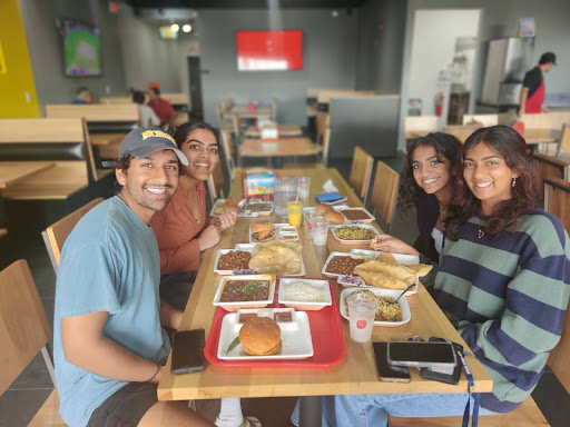 People enjoying there food at NeeHee's