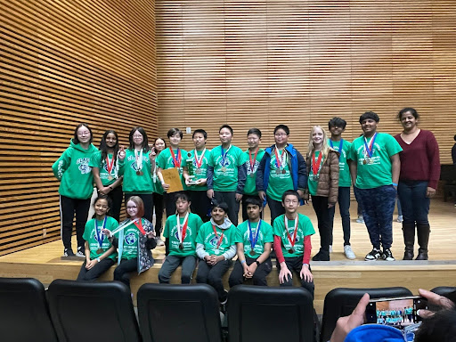 Clague SciOly team (both red and blue teams) on stage after receiving an overall ranking of second place at regionals. (Note that not every team member was at the award ceremony.)