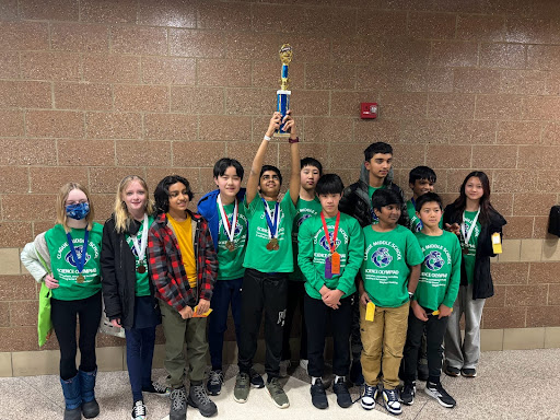 Photo courtesy of Clague SciOly
The Clague SciOly team with their fist place trophy.
