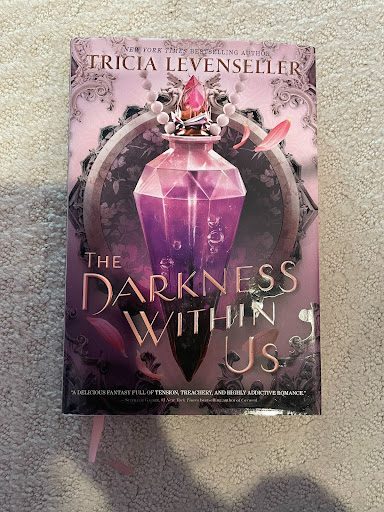 “The Darkness Within Us” by Tricia Levenseller is a young adult novel filled with fantasy, action, and romance. Photo courtesy of Anya He.