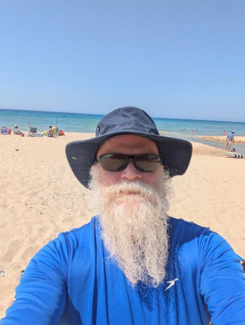 Philip Cartman, an ELA teacher at Clague, at the beach.