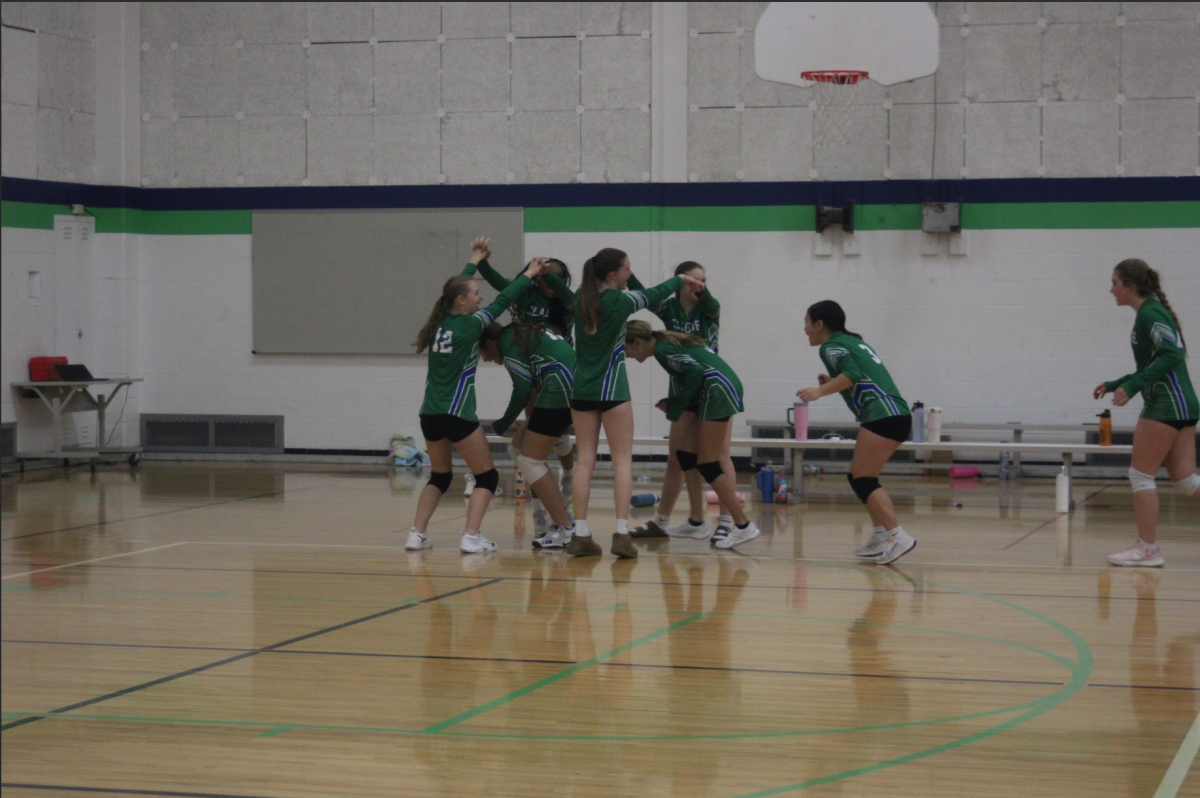 A team cheering on the B-team before their game against Tappan.

