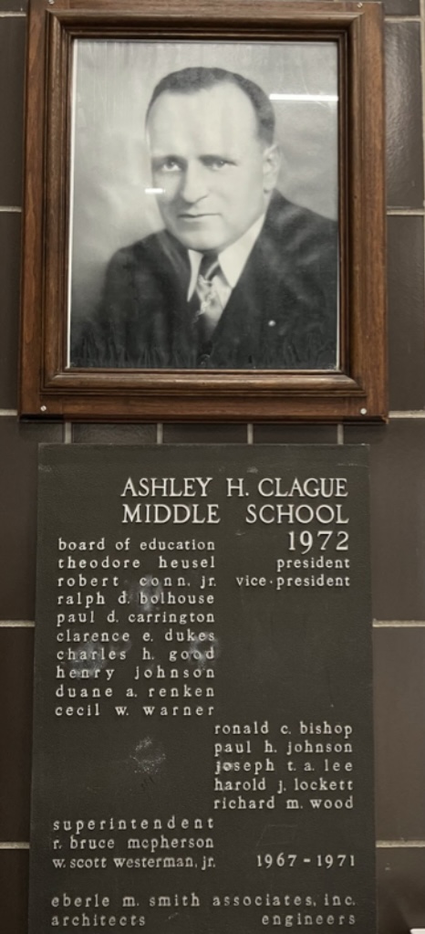 	In the Clague Middle school main lobby, there is a plaque commemorating the work of Ashley Clague, as well as a picture of him right after he was elected president of the school board in 1945.
