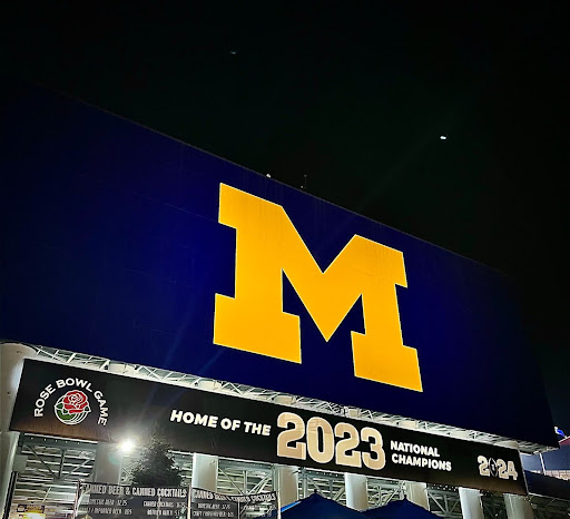 
The jumbotron on the north side of Michigan Stadium with the 2023 National Championship banner below after the 2024 game against Fresno State.

