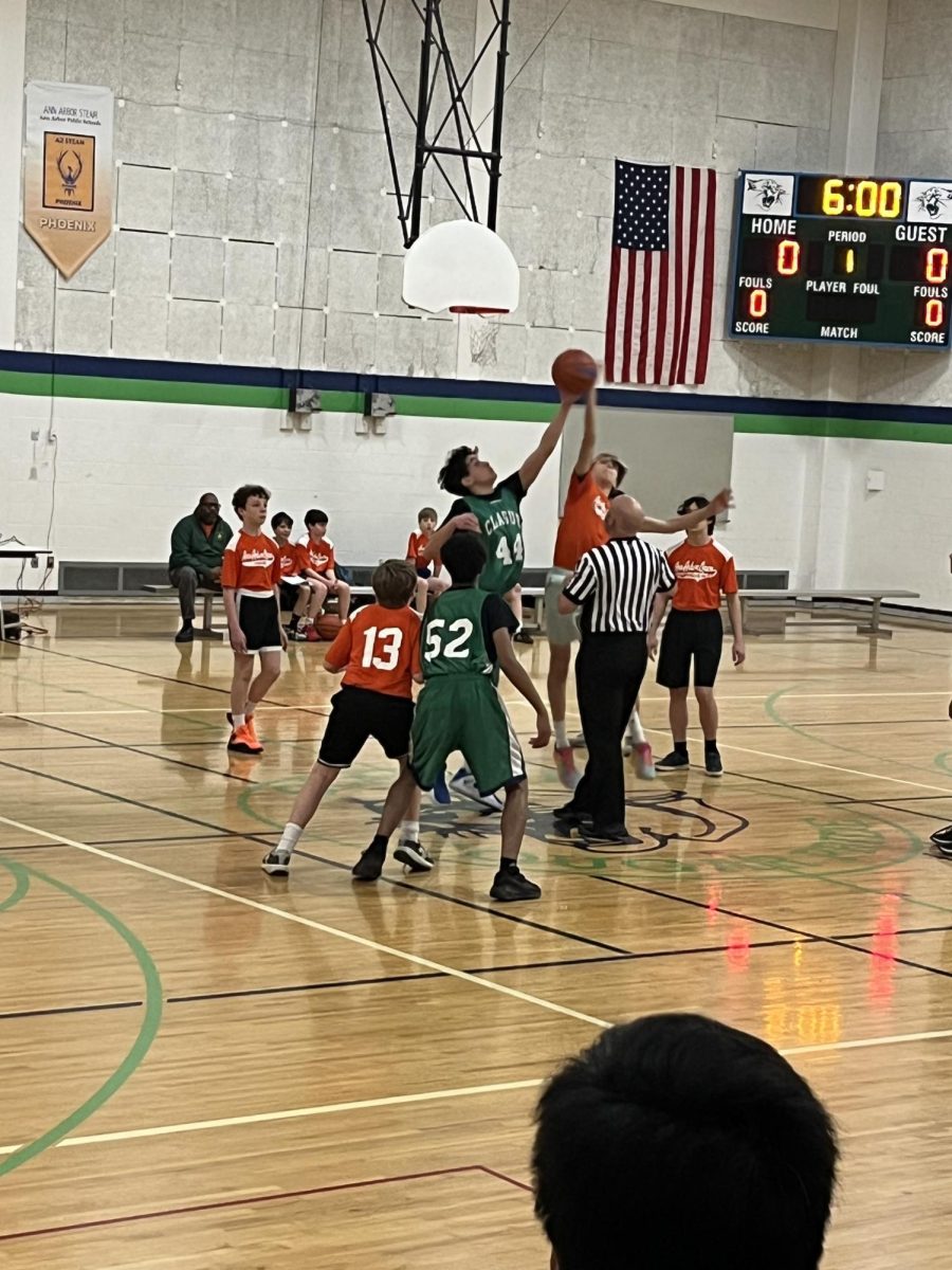 Clague tips off against Ann Arbor Open.