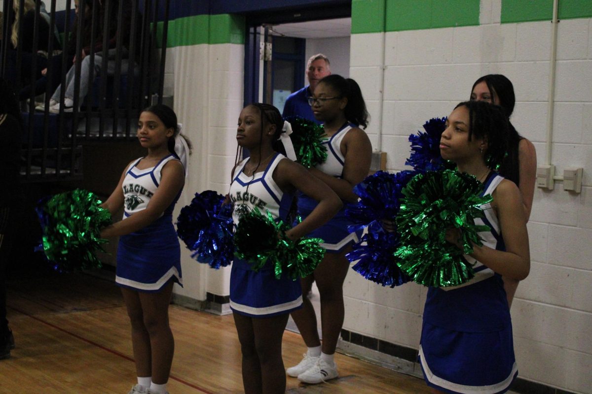 The Clague cheer team performs a cheerleading routine during the February 10th men’s basketball matchup against Tappan. The Clague B Team won 42-23 and the A Team won 42-19.
