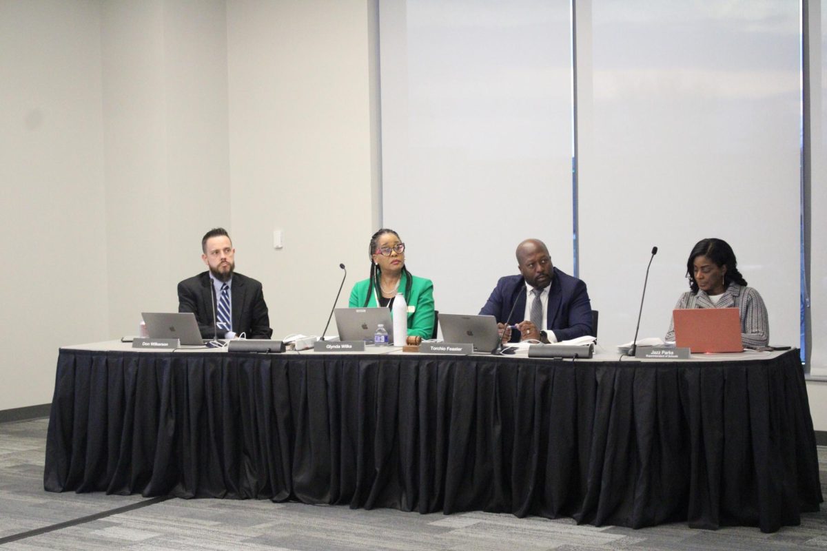 Don Wilkerson, the treasurer for the school board, resigned from the position on May 5.  He is on the far left hand side of the table.
